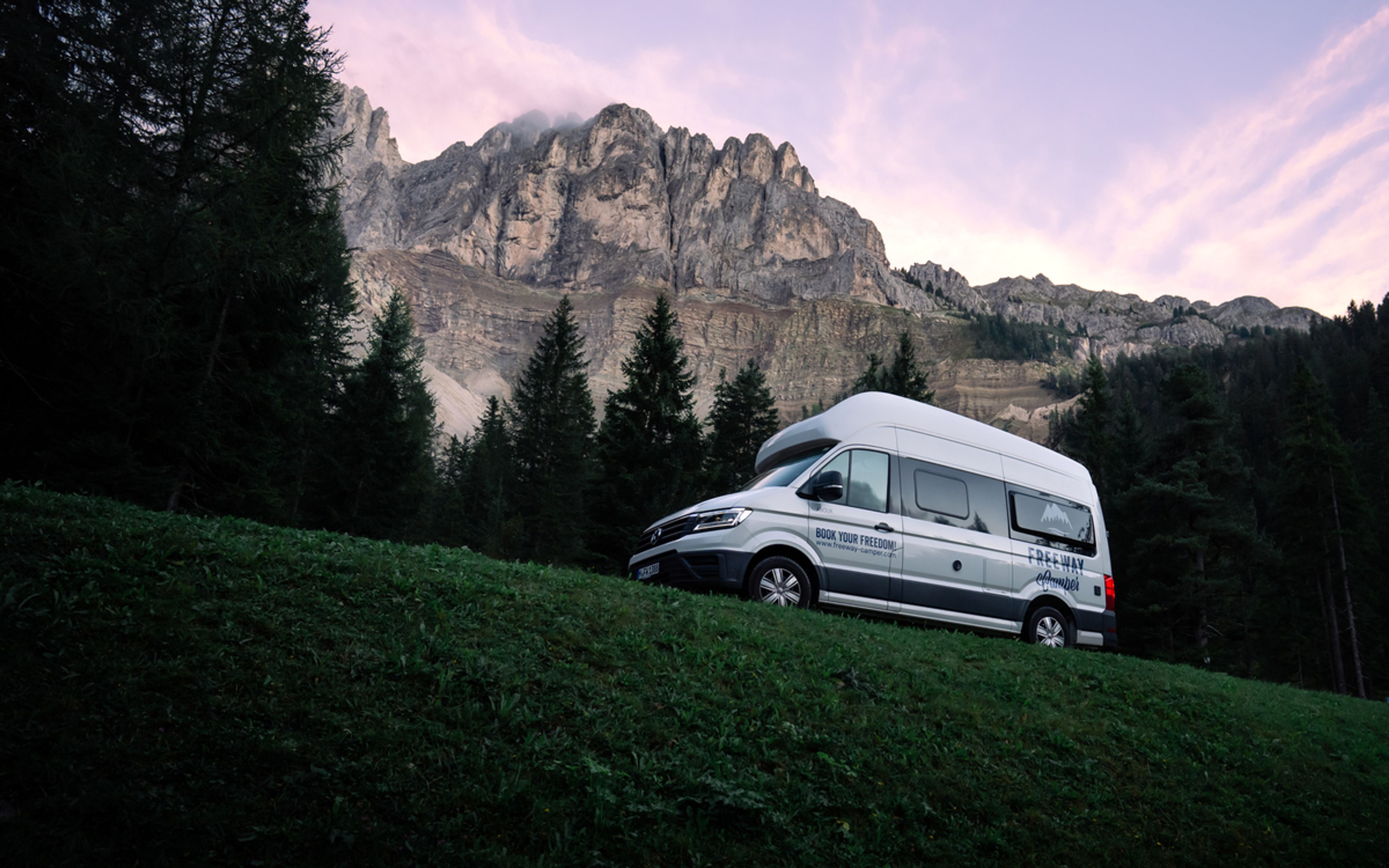 VW Grand California camper van among the Italian Alps, the Dolomites, Italy
